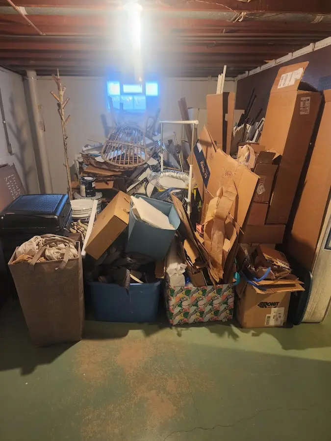 Roll-off dumpster container at job site for 6 Yard Dumpster Rental in Parkland